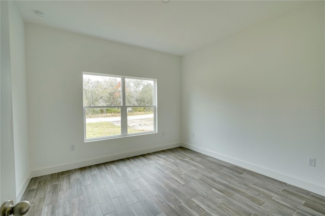 empty room featuring light hardwood / wood-style floors