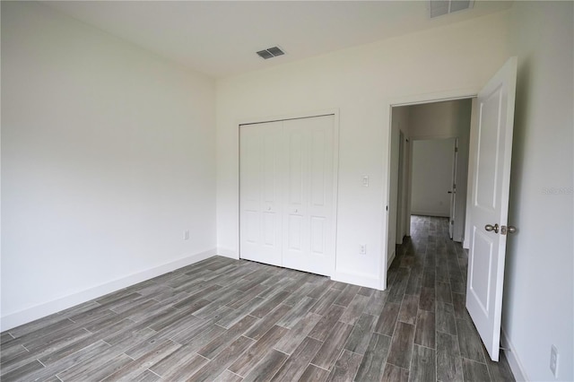 unfurnished bedroom featuring a closet