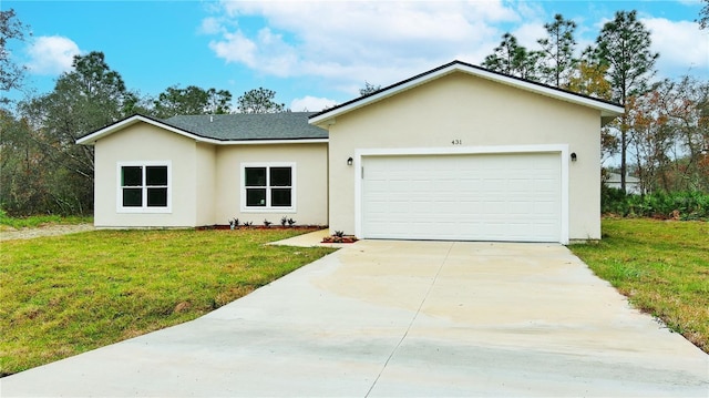 single story home featuring a garage and a front lawn