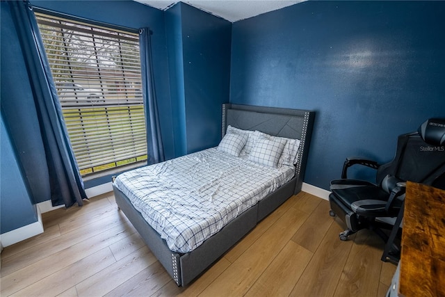 bedroom featuring light hardwood / wood-style floors