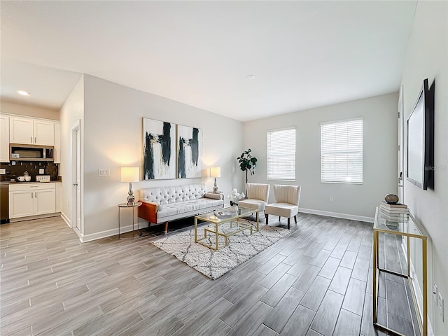 8886 Fallen Oak Dr, Davenport, FL 33896 - living room with light wood-type flooring and recessed lighting