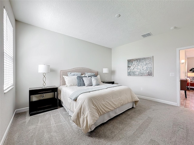 8886 Fallen Oak Dr, Davenport, FL 33896 - bedroom with carpet and a textured ceiling