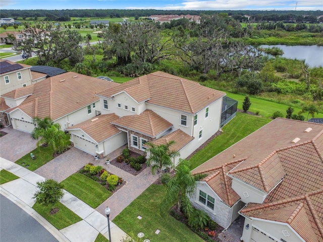 8886 Fallen Oak Dr, Davenport, FL 33896 - aerial perspective of suburban area featuring a large body of water