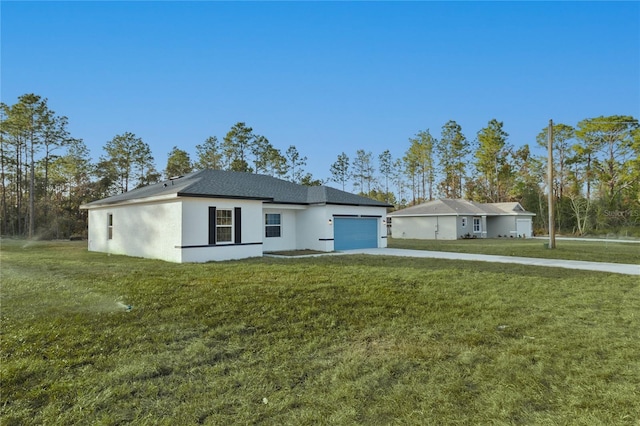 ranch-style house featuring driveway, a garage, a front lawn, and stucco siding