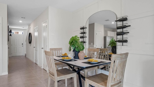 dining room featuring light tile patterned floors