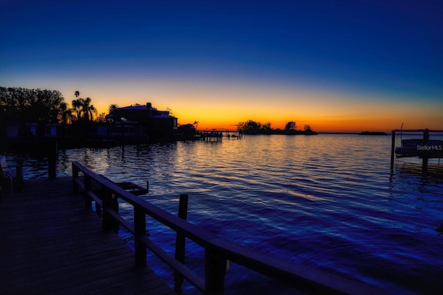 view of dock with a water view