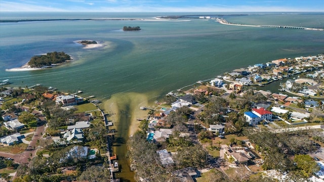 birds eye view of property featuring a water view and a residential view