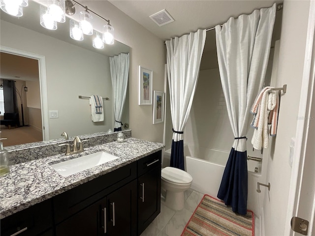 full bathroom with toilet, vanity, tile patterned floors, and shower / tub combo with curtain