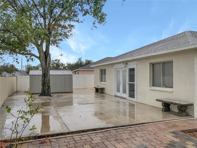 view of patio / terrace with a storage shed