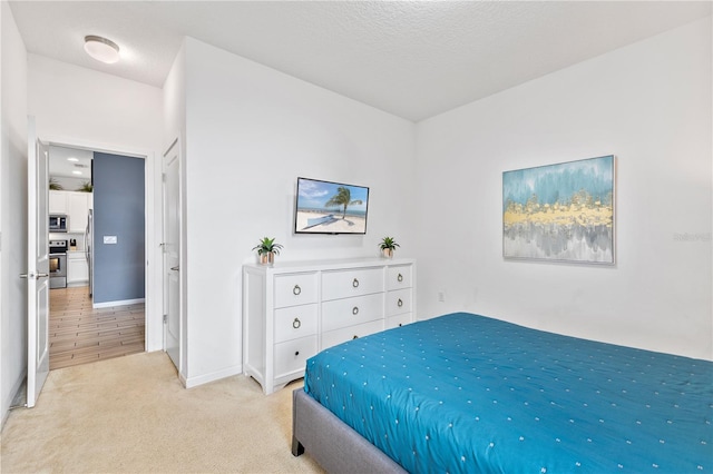 bedroom featuring light colored carpet