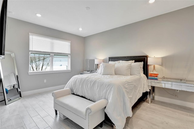 bedroom with light hardwood / wood-style flooring