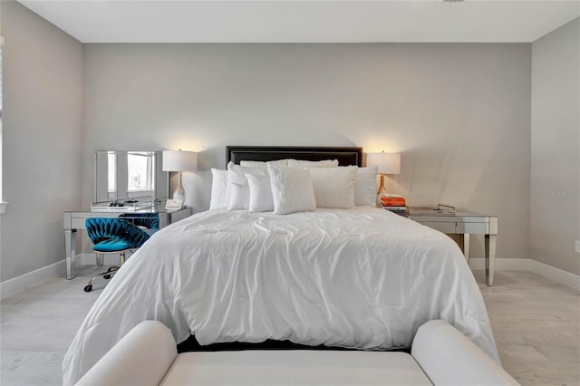 bedroom with light wood-type flooring