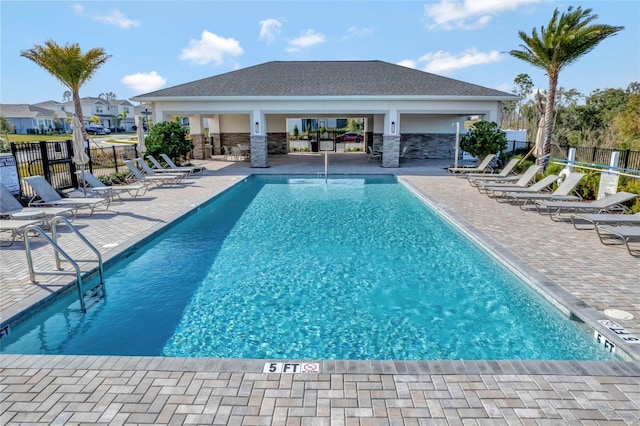 view of swimming pool featuring a patio