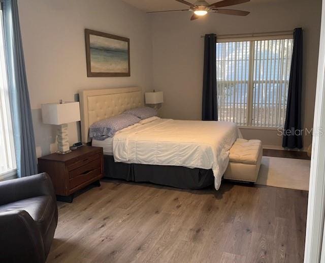 bedroom featuring ceiling fan and light wood-type flooring