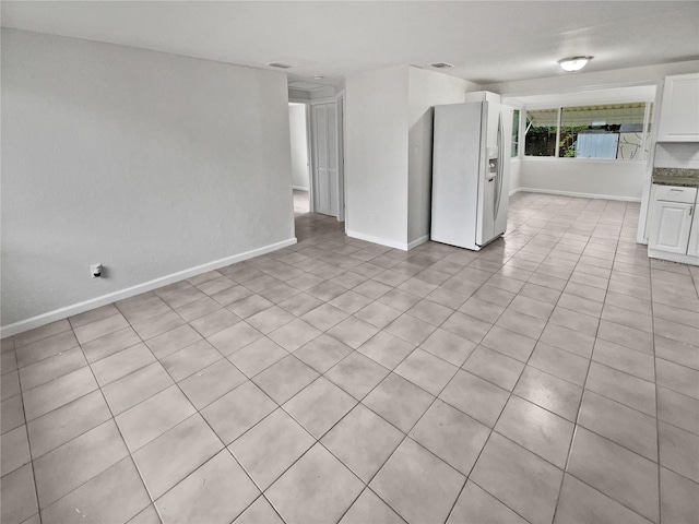 interior space with light tile patterned flooring