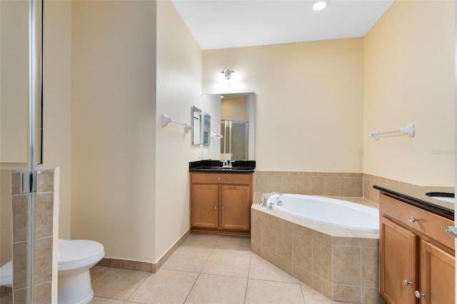 full bathroom featuring tile patterned floors, vanity, toilet, and shower with separate bathtub