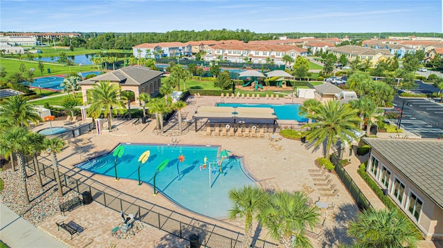 view of pool featuring a water view