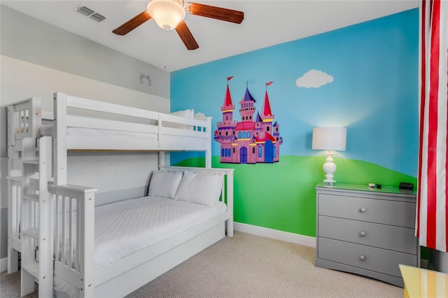 bedroom featuring light colored carpet and ceiling fan