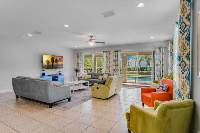 living room with light tile patterned flooring and ceiling fan