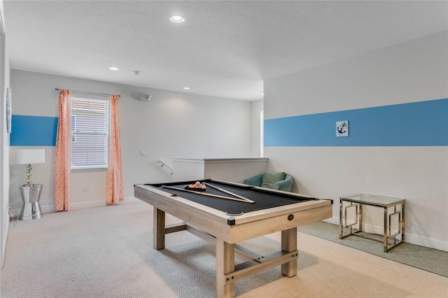 rec room with pool table and light colored carpet