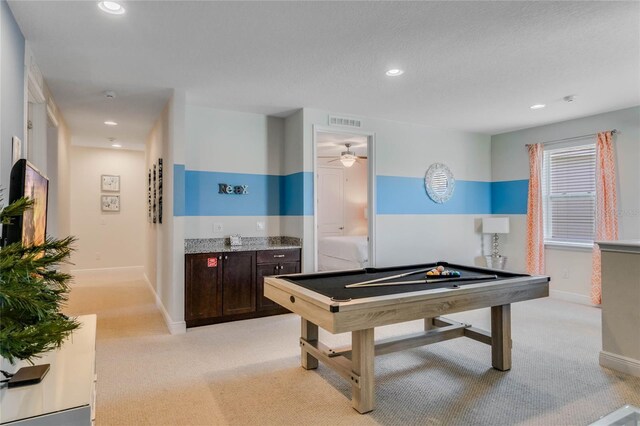 playroom with ceiling fan, light carpet, and pool table