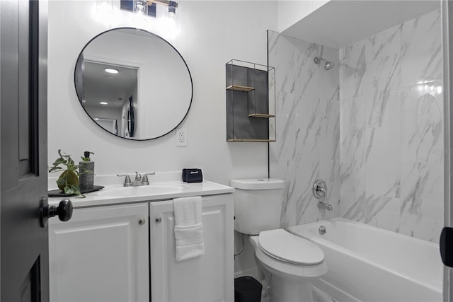 full bathroom with tiled shower / bath combo, toilet, and vanity