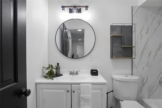 full bathroom featuring toilet, vanity, and tiled shower / bath combo