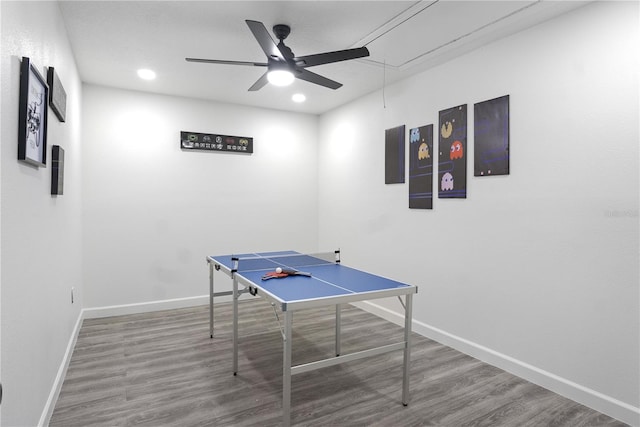 recreation room with hardwood / wood-style floors