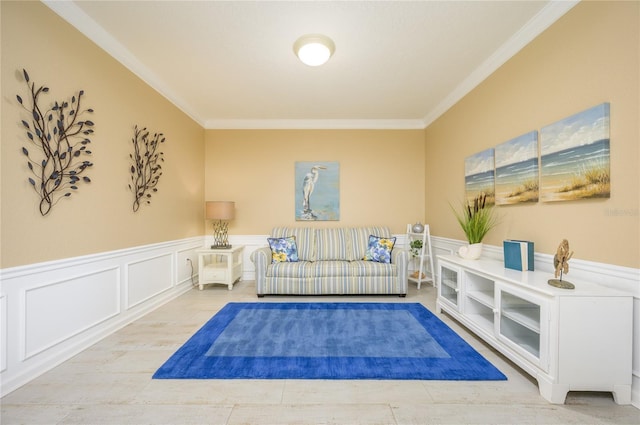 living area with ornamental molding and light wood-type flooring