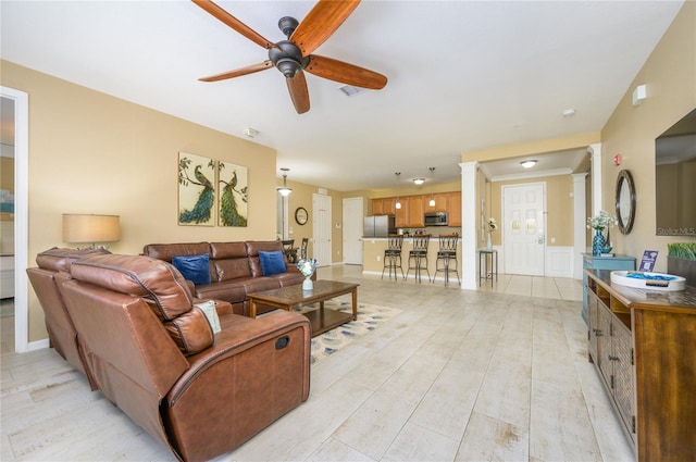 5012 Shoreway Loop Unit 10207, Orlando, FL 32819 - living area with a ceiling fan and light wood-style floors