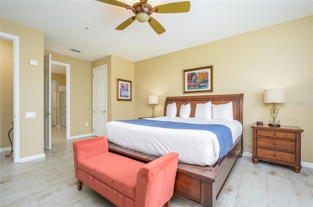 5012 Shoreway Loop Unit 10207, Orlando, FL 32819 - bedroom with light wood-type flooring and ceiling fan