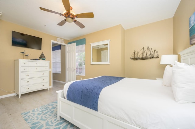 5012 Shoreway Loop Unit 10207, Orlando, FL 32819 - bedroom featuring light wood-style flooring and ceiling fan