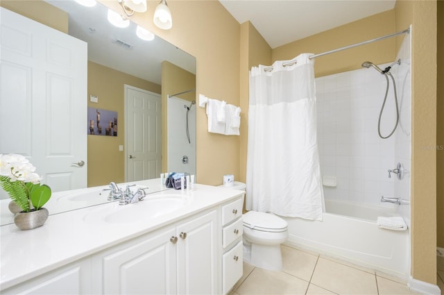 5012 Shoreway Loop Unit 10207, Orlando, FL 32819 - bathroom featuring vanity, tile patterned floors, and shower / tub combo with curtain