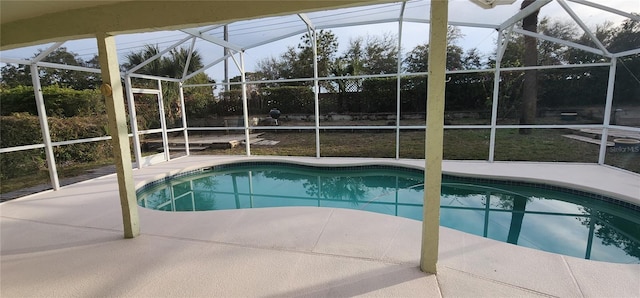 view of pool featuring a lanai and a patio