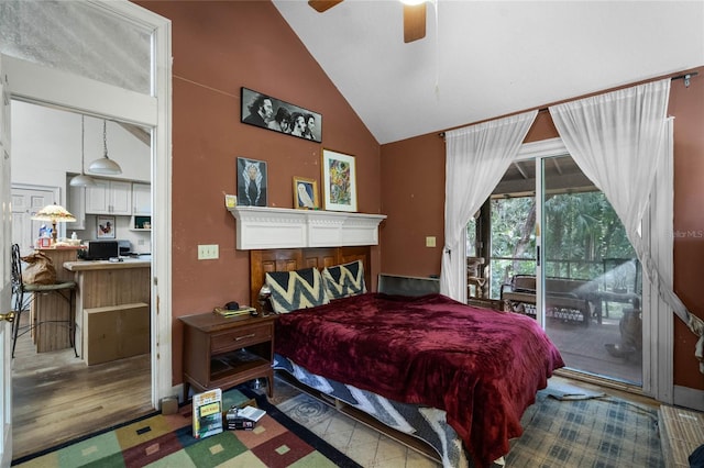 bedroom with lofted ceiling, access to exterior, and ceiling fan