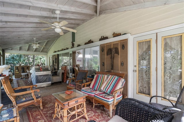 sunroom featuring wood ceiling, ceiling fan, and vaulted ceiling with beams