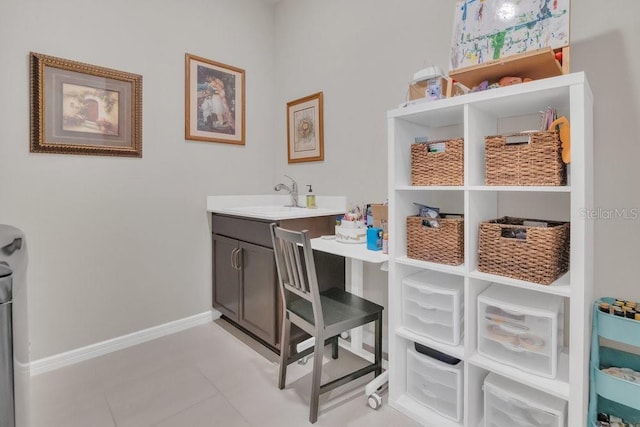 bathroom featuring tile patterned floors and vanity