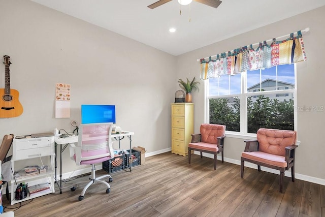 office area with hardwood / wood-style flooring and ceiling fan