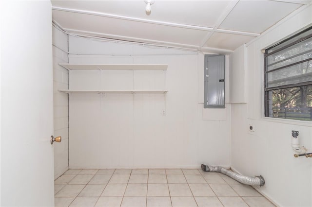 washroom featuring electric panel and hookup for an electric dryer