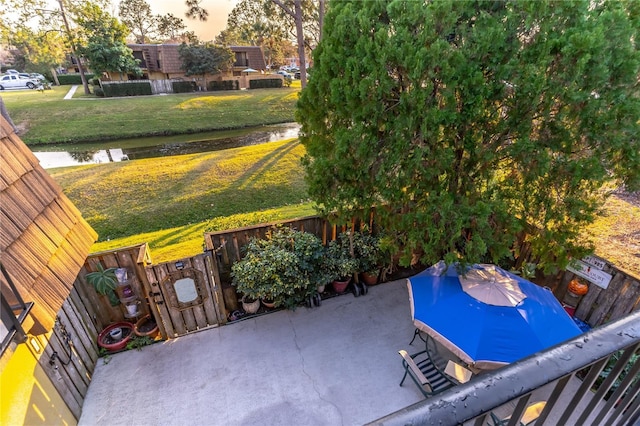 patio terrace at dusk with a yard