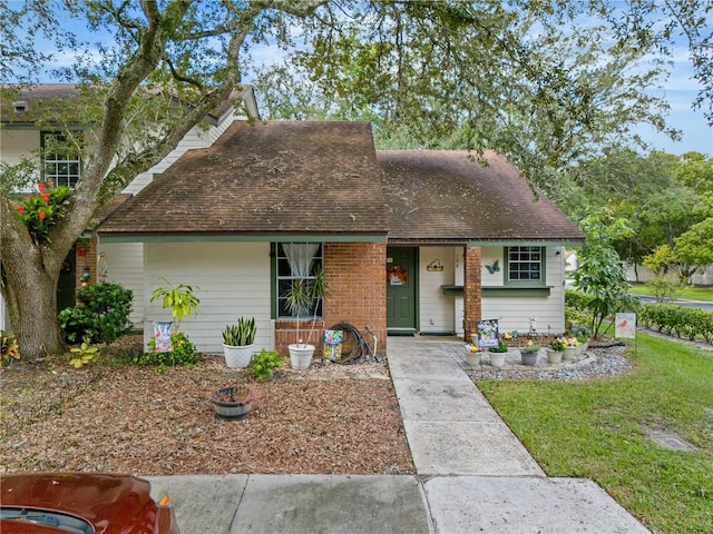 view of front of house with a front lawn