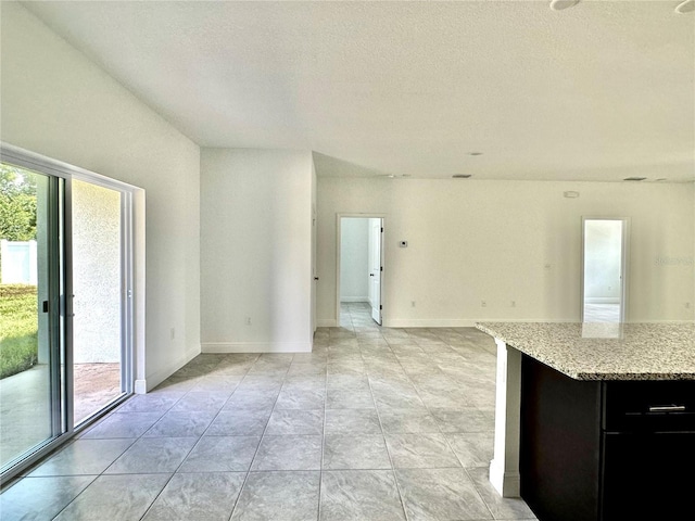 interior space featuring a textured ceiling