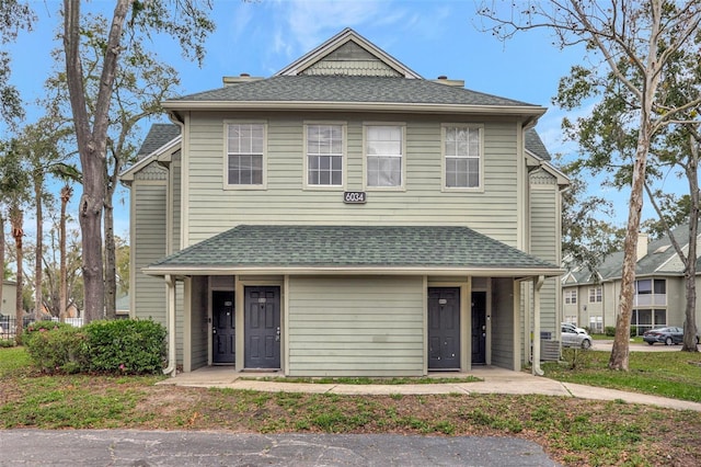 view of front of house featuring a shingled roof