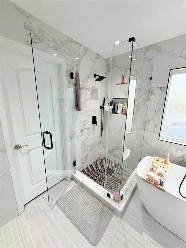 bathroom with independent shower and bath