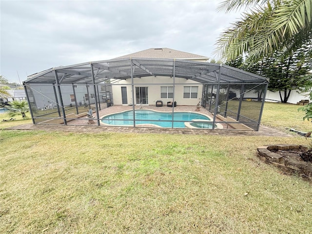 view of swimming pool featuring a patio area and a yard