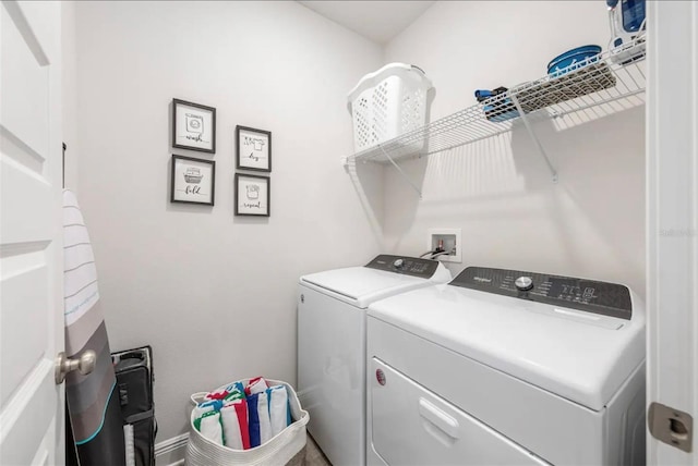 laundry room featuring independent washer and dryer