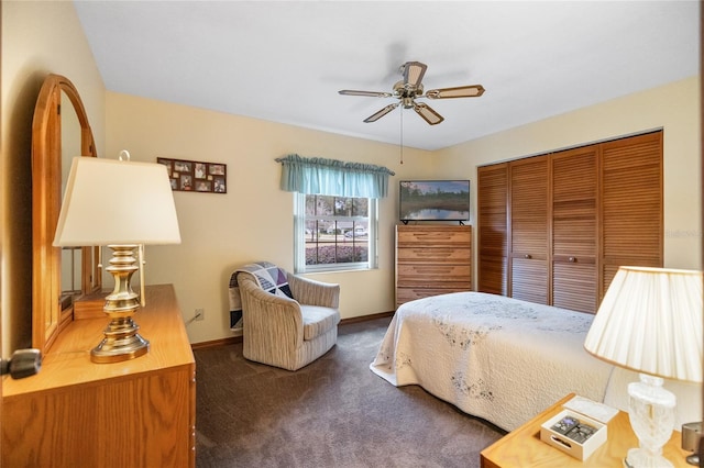 carpeted bedroom with a closet and ceiling fan