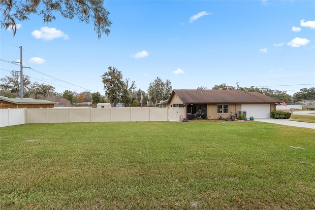 view of yard featuring a garage