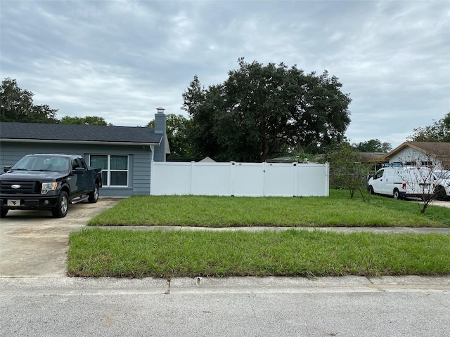 exterior space featuring a front lawn