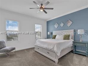 bedroom featuring ceiling fan and carpet flooring